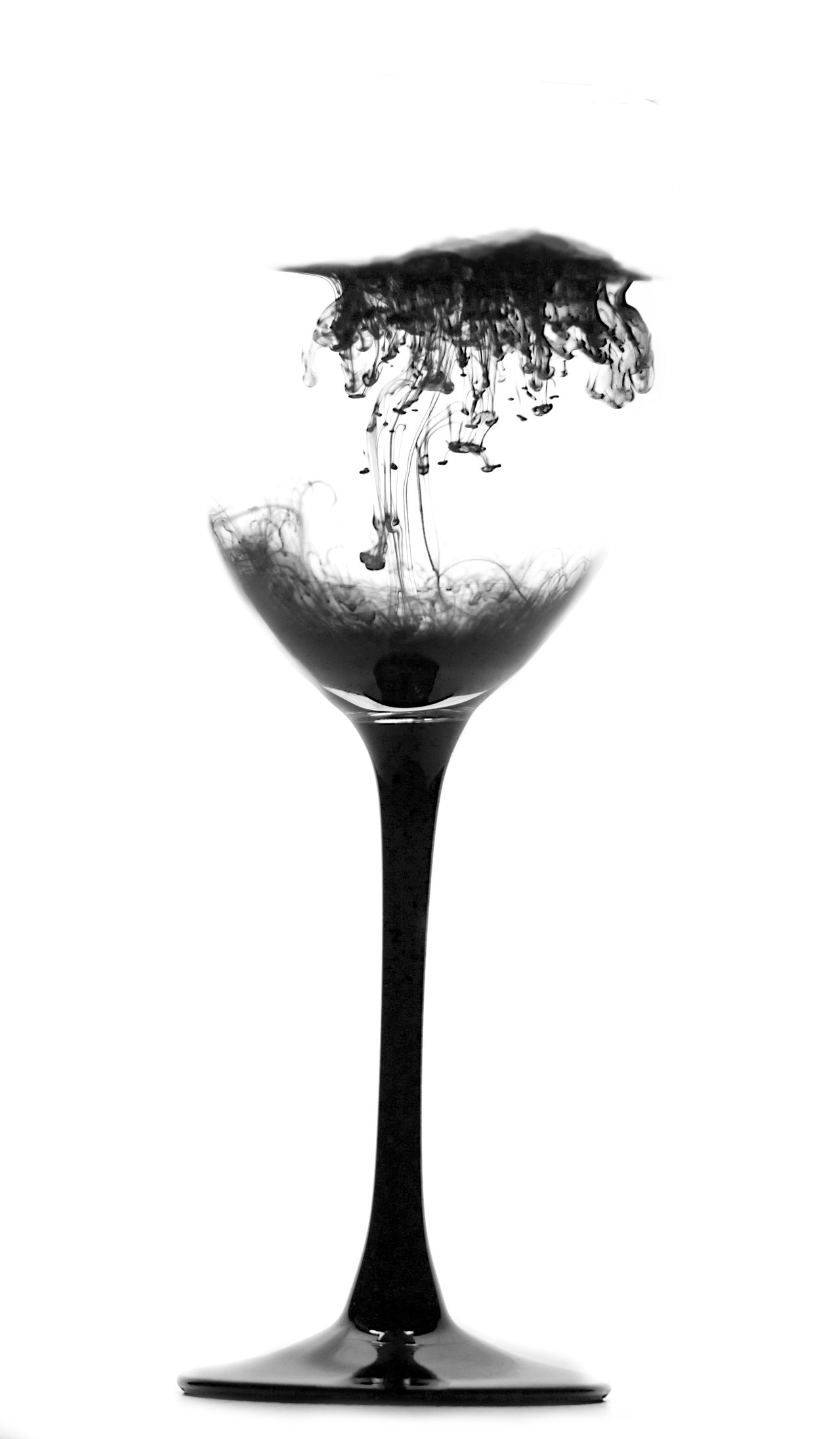 surreal wine glass with dripping cloudlike ink
